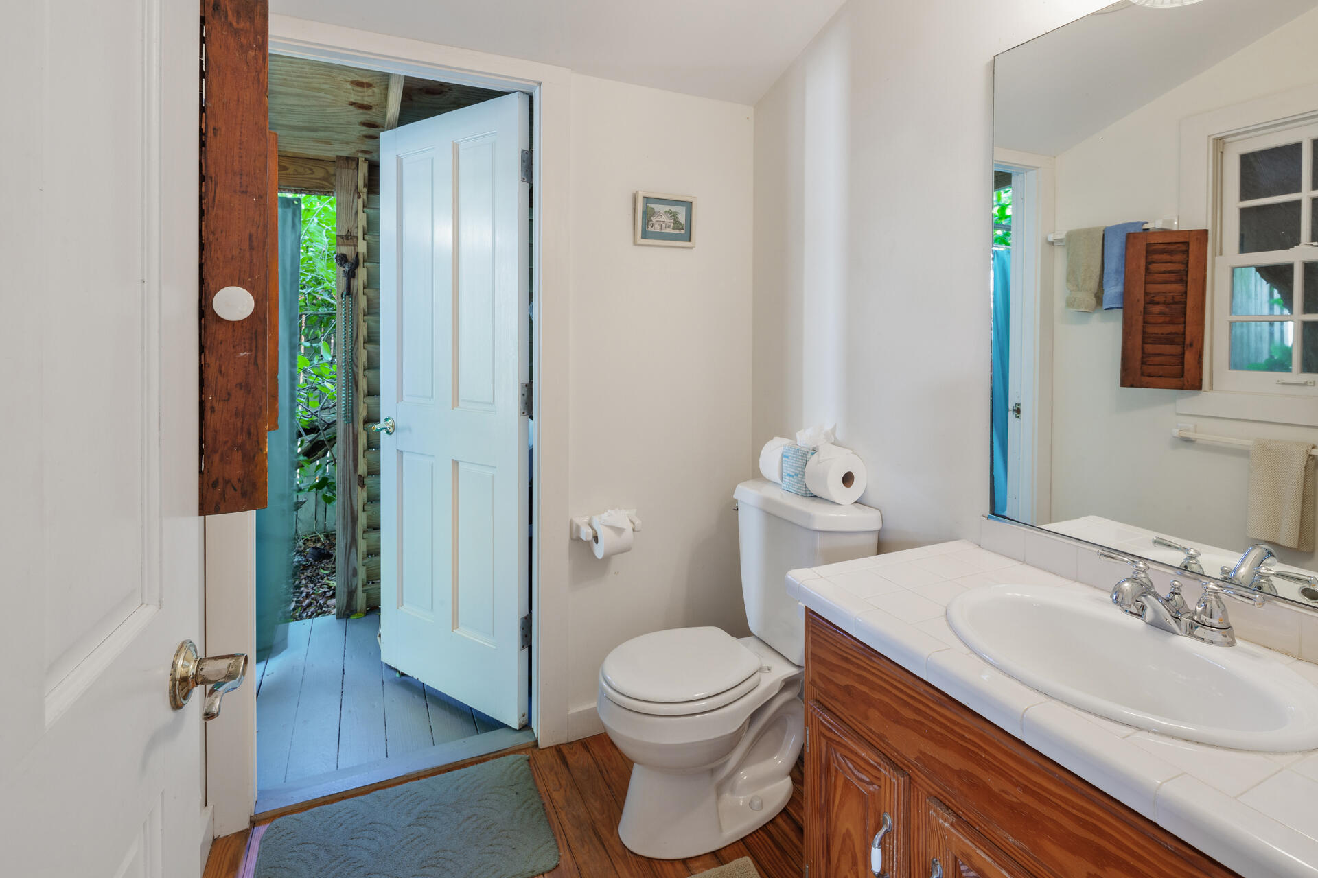 623 Catholic Lane Key West, FL 33040 - Photo 25 of 29 a bathroom with a sink a toilet and shower