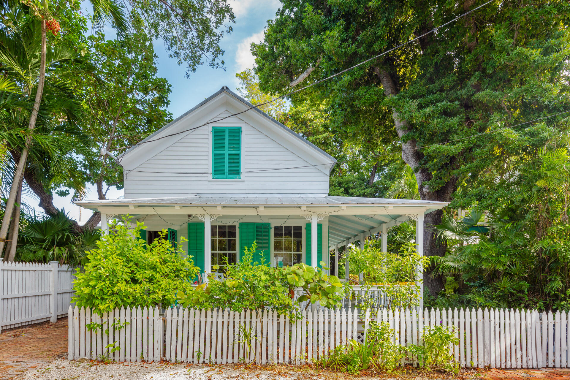 623 Catholic Lane Key West, FL 33040 - Photo 3 of 29 a front view of a house with a garden