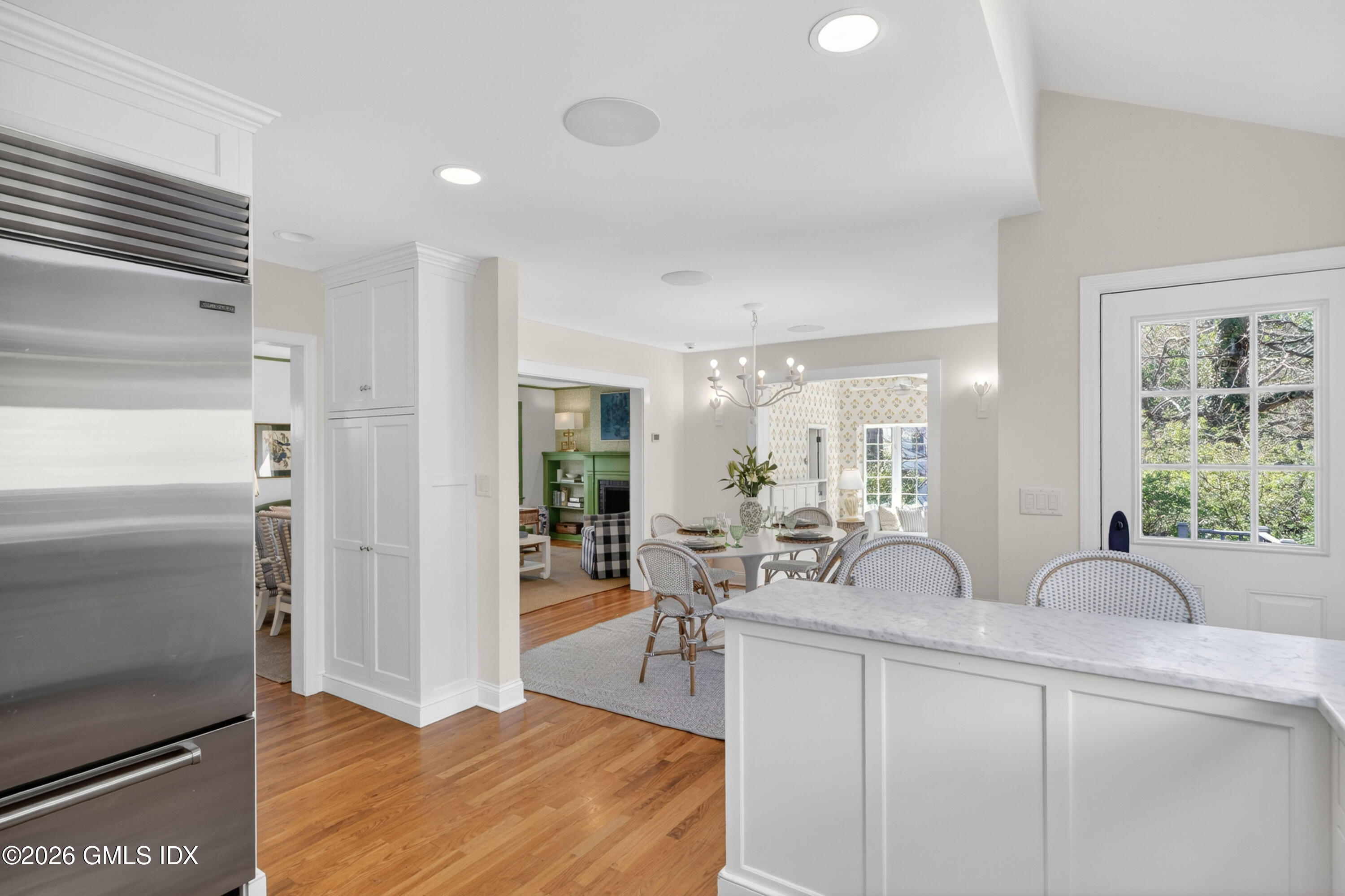 20 Ridge Road Cos Cob, CT 06807 - Photo 15 of 36 a very nice looking living room with a large window and wooden floors