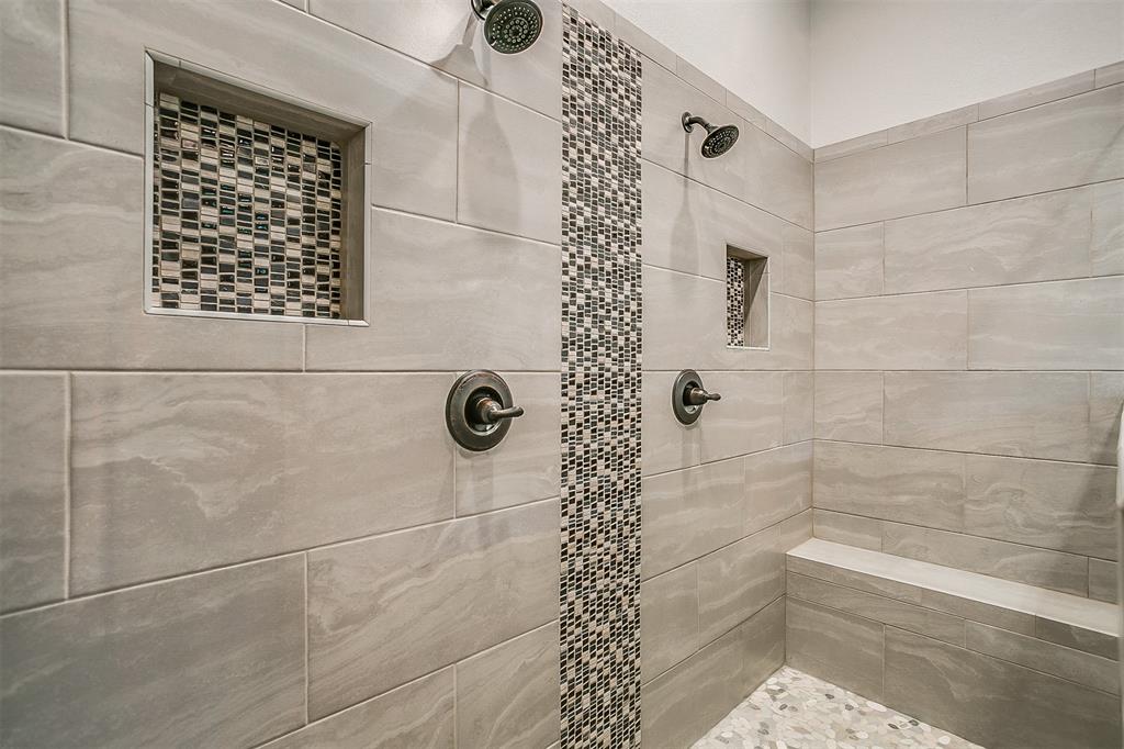409 Glade Crest Road Azle, TX 76020 - Photo 18 of 31 a bathroom with a shower