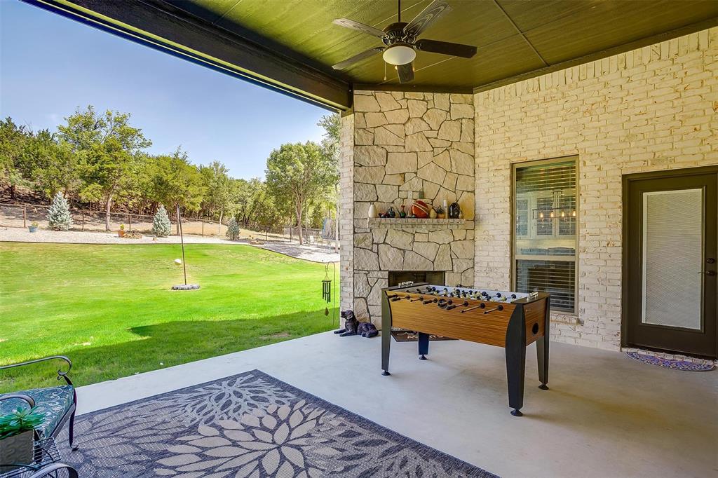 409 Glade Crest Road Azle, TX 76020 - Photo 29 of 31 a house view with a garden space