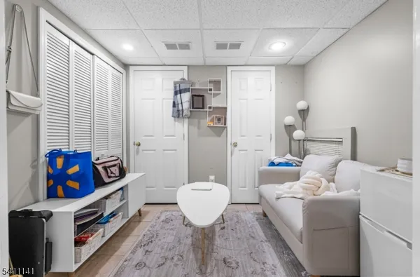 a living room with furniture and a table