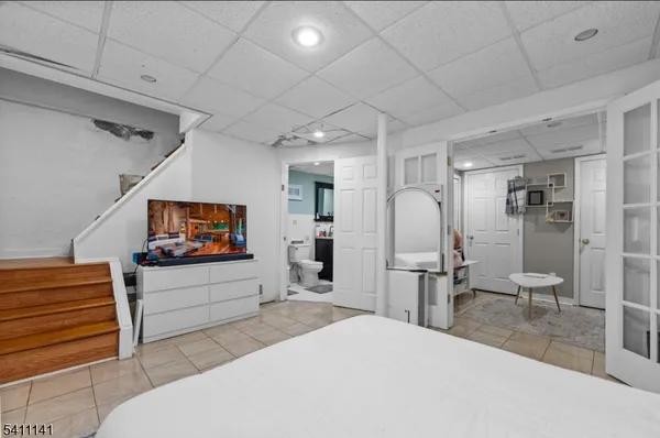 a kitchen with a sink and a refrigerator