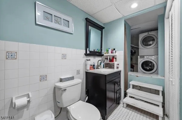 a view of a patio with table and chairs and wooden floor