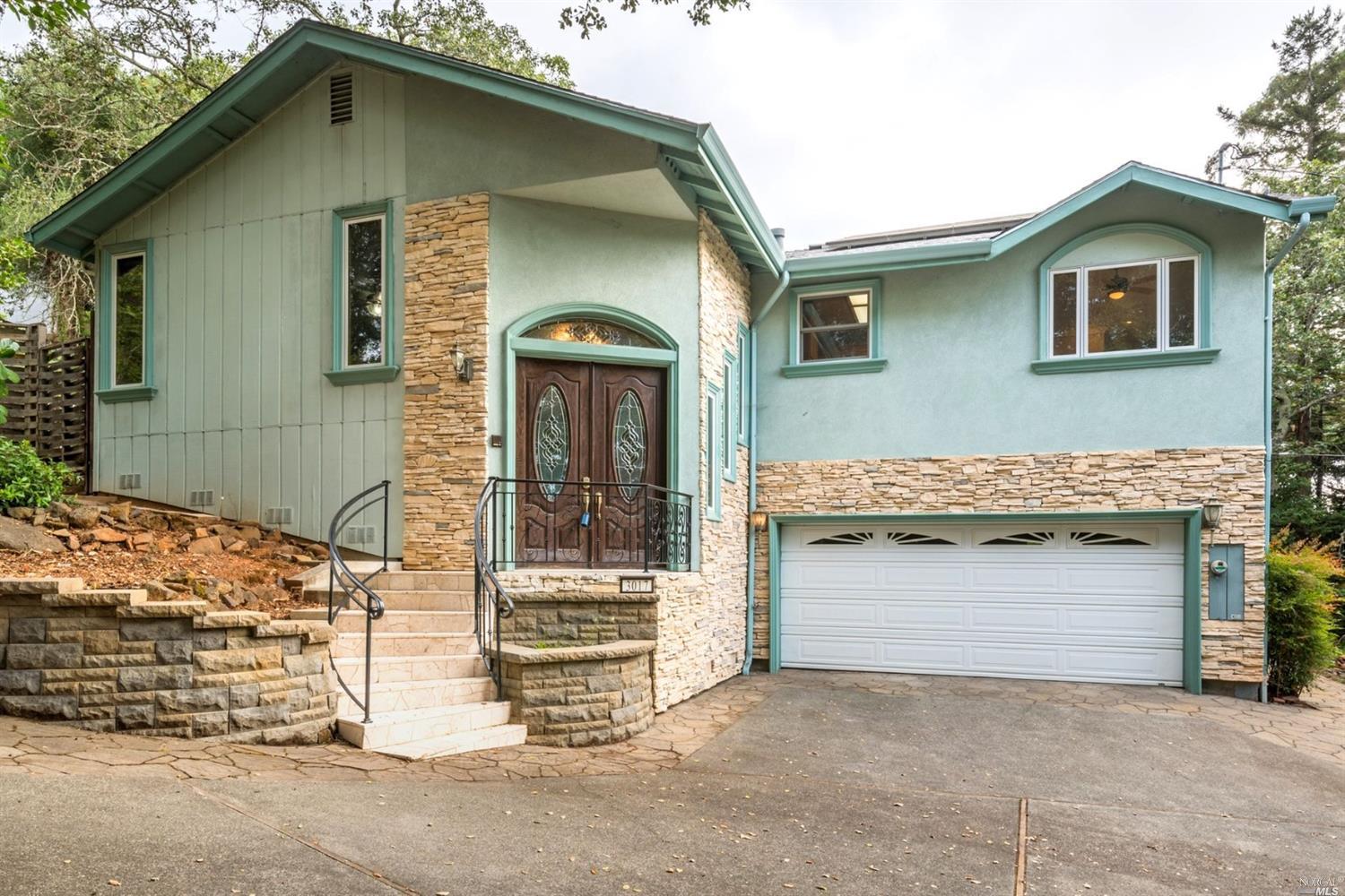 3017 Sunridge Drive Santa Rosa, CA 95404 - Photo 1 of 1 a front view of a house with garage