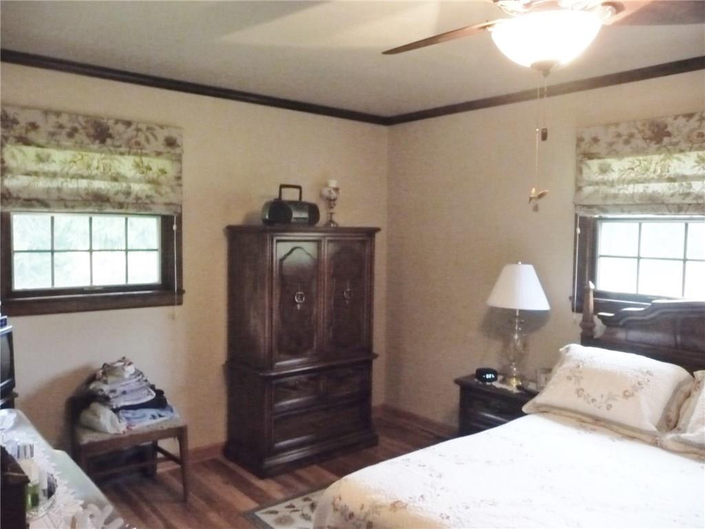 277 Kaufman Road Gibsonia, PA 15044 - Photo 14 of 25 Master Bedroom with ceiling fan and two windows.