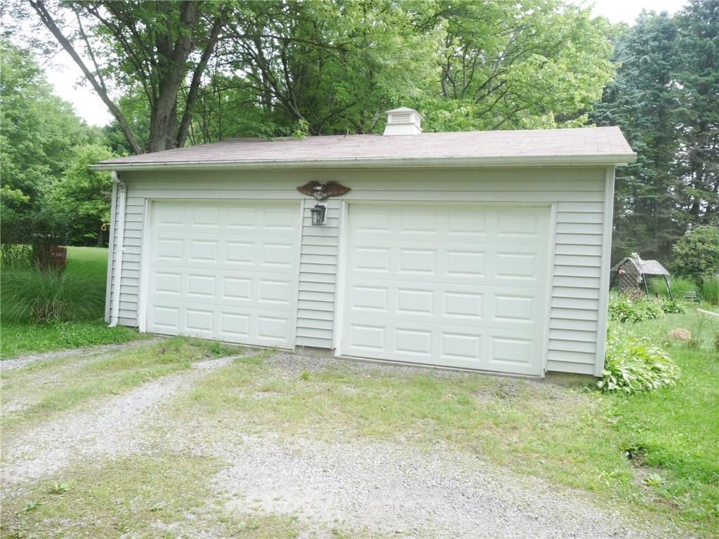 277 Kaufman Road Gibsonia, PA 15044 - Photo 22 of 25 Detached two car garage with new doors and openers. Hinge door to right rear corner.