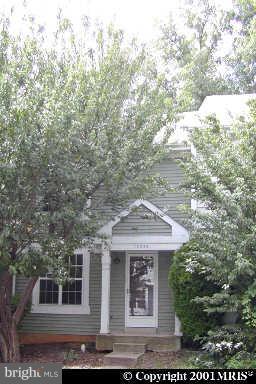 15248 Streamside Court Dumfries, VA 22025 - Photo 1 of 1 a front view of a house with a garden