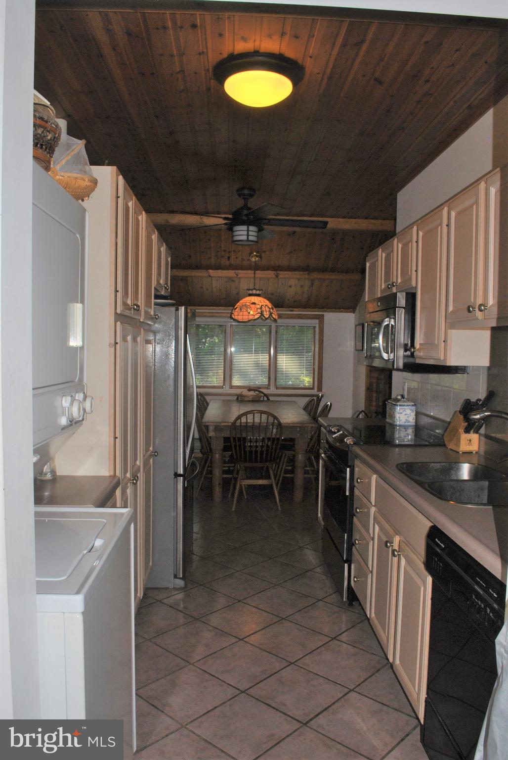 4910 Huntingfield Road Rock Hall, MD 21661 - Photo 15 of 29 Looking through the galley kitchen to dining room