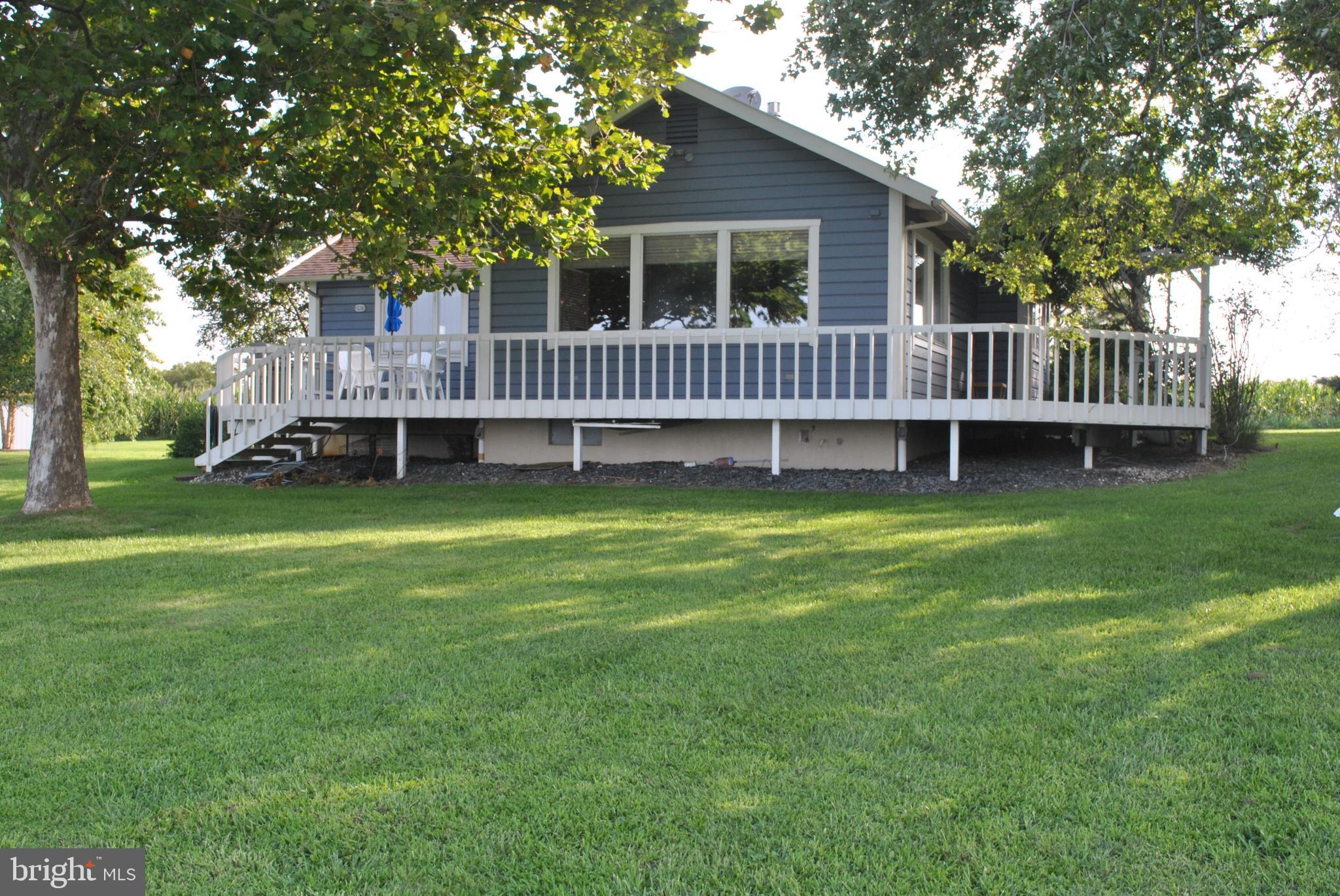 4910 Huntingfield Road Rock Hall, MD 21661 - Photo 24 of 29 The backyard gently slopes to the water