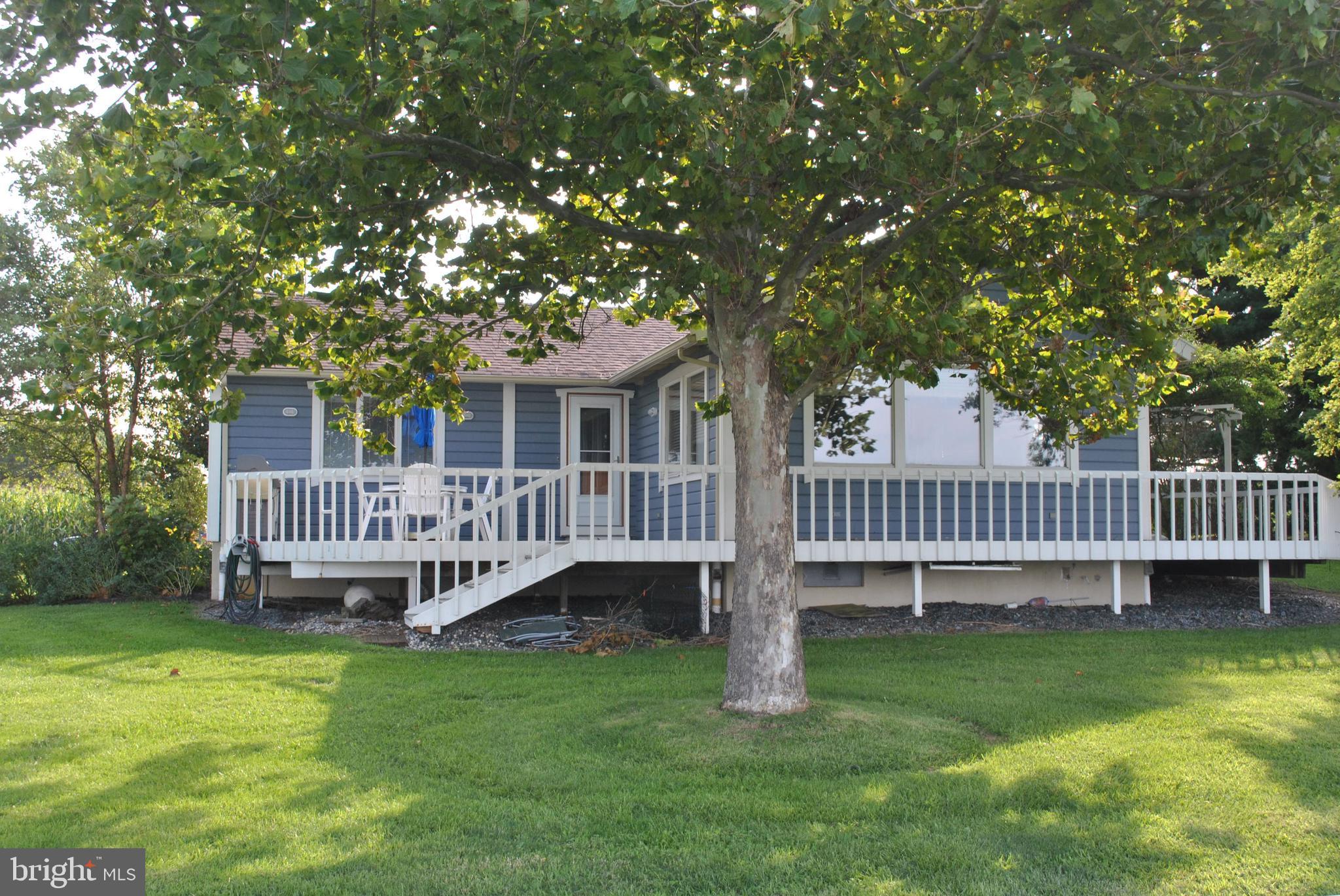 4910 Huntingfield Road Rock Hall, MD 21661 - Photo 6 of 29 Wrap-around decks along the rear of the house