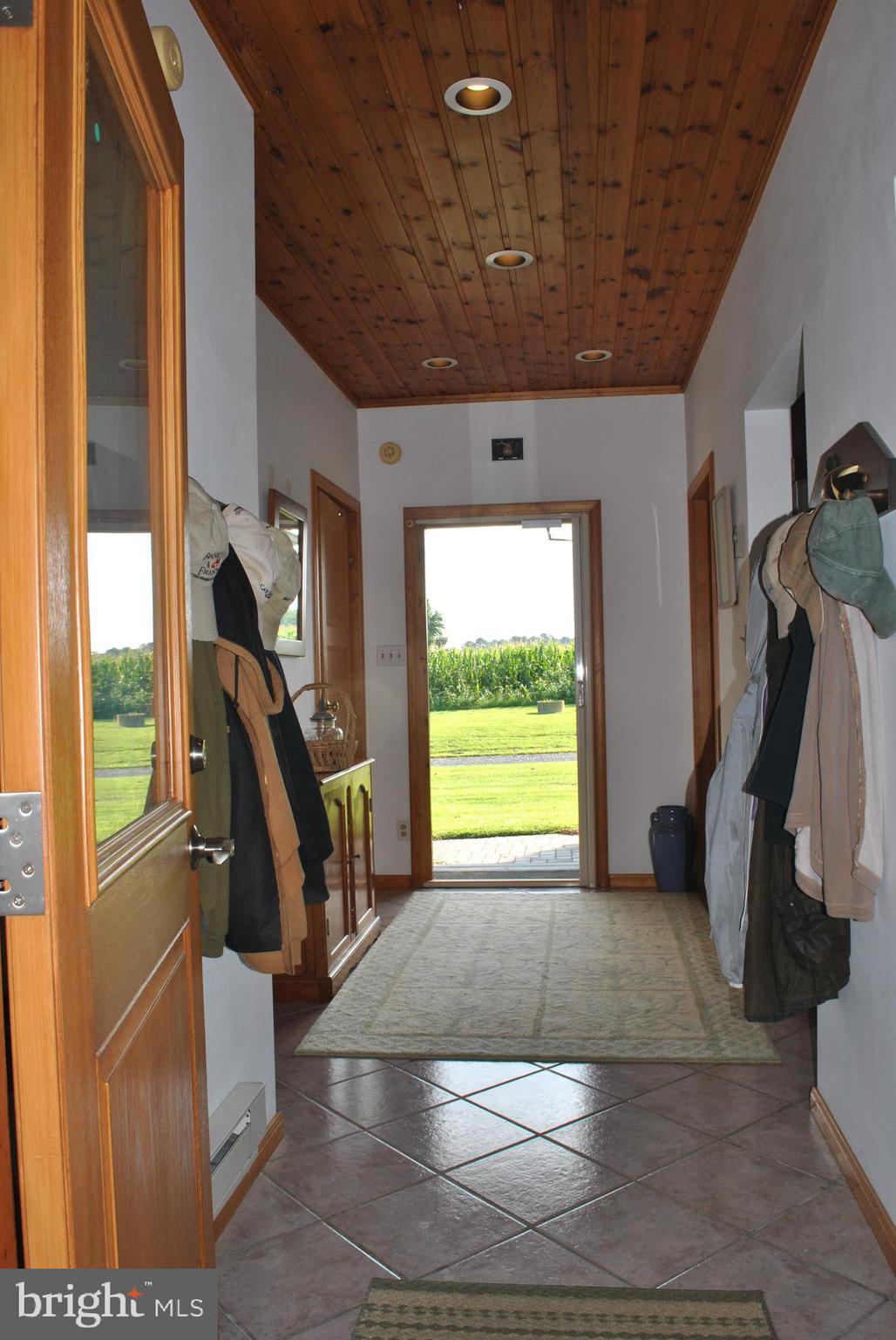 4910 Huntingfield Road Rock Hall, MD 21661 - Photo 9 of 29 Front to rear access through the foyer