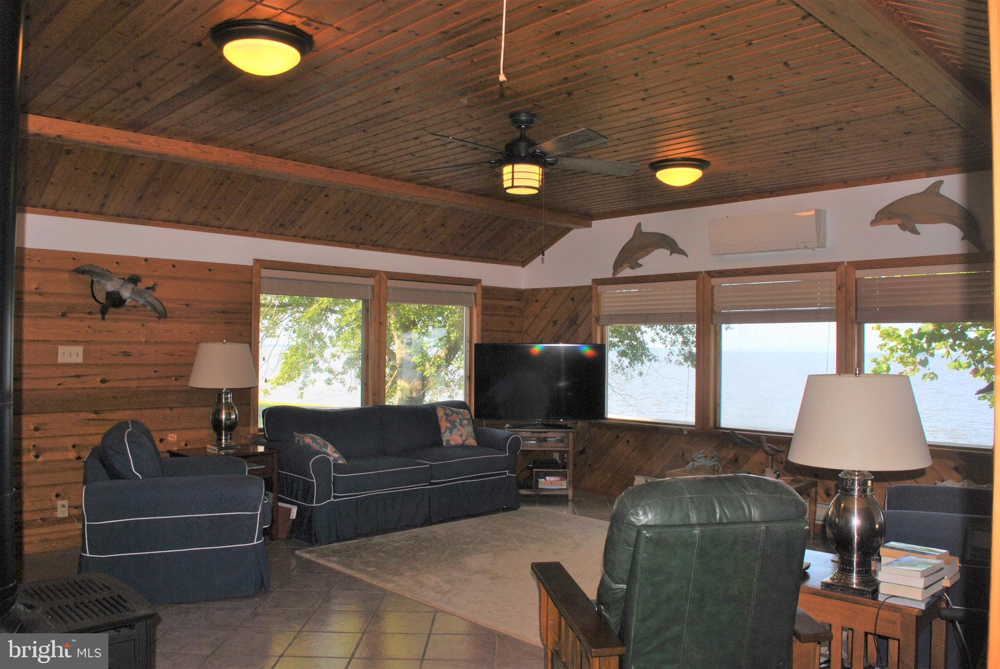 4910 Huntingfield Road Rock Hall, MD 21661 - Photo 10 of 29 Large 18' x 20' living room overlooking the Bay