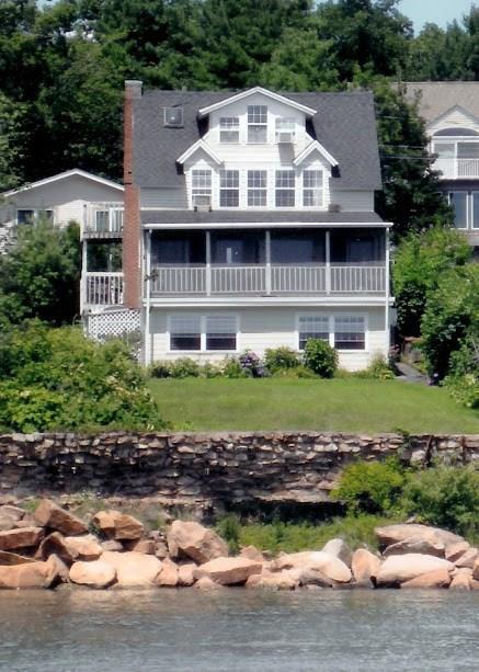 54 Brocketts Point Road Branford, CT 06405 - Photo 1 of 1 a view of a house with a yard