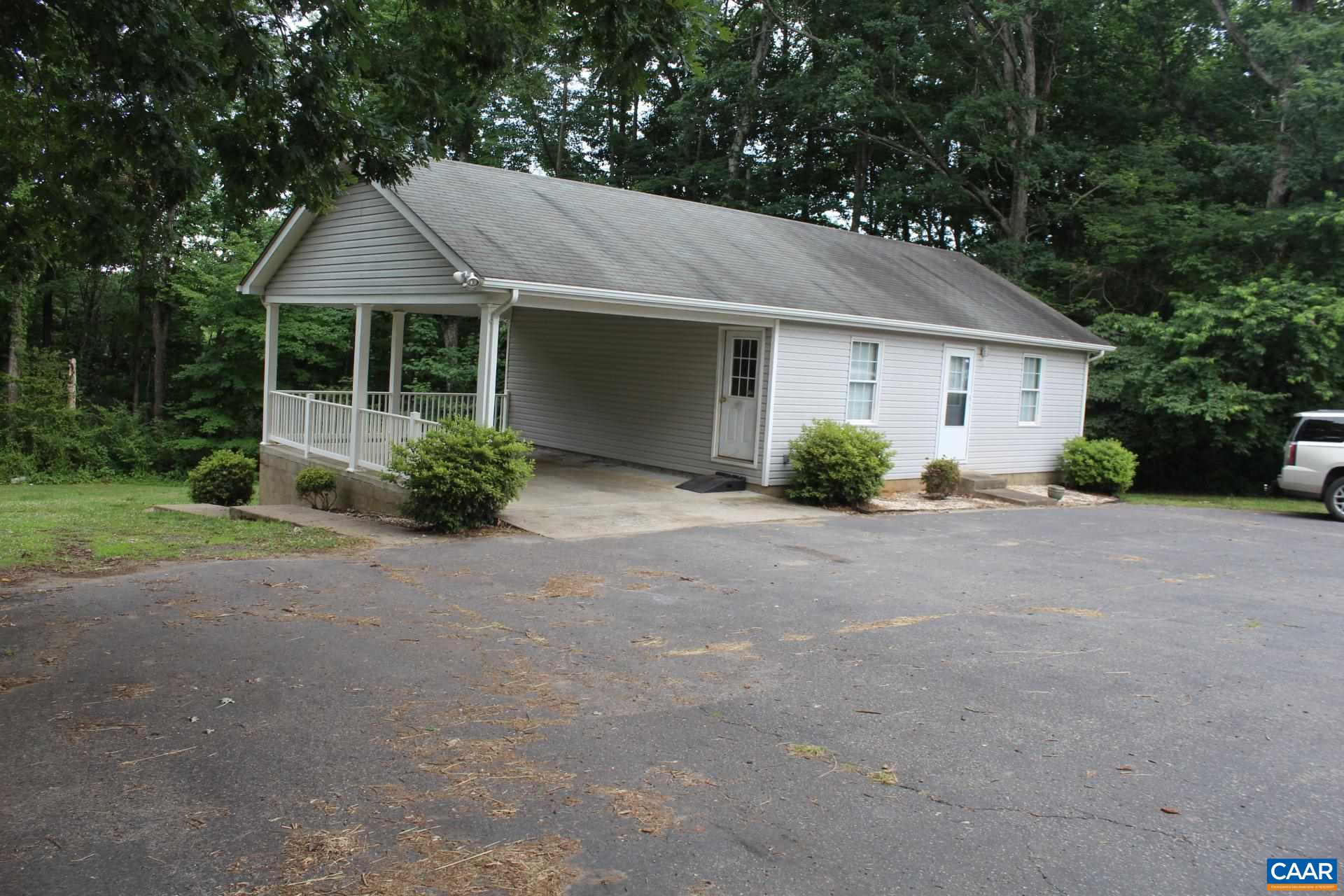 3456 South Constitution Route Dillwyn, VA 23936 - Photo 16 of 38 a view of a house with yard and plants