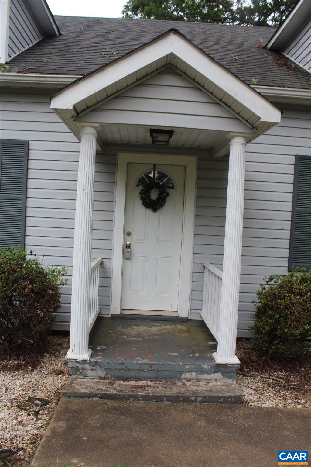 3456 South Constitution Route Dillwyn, VA 23936 - Photo 3 of 38 a front view of a house with garage