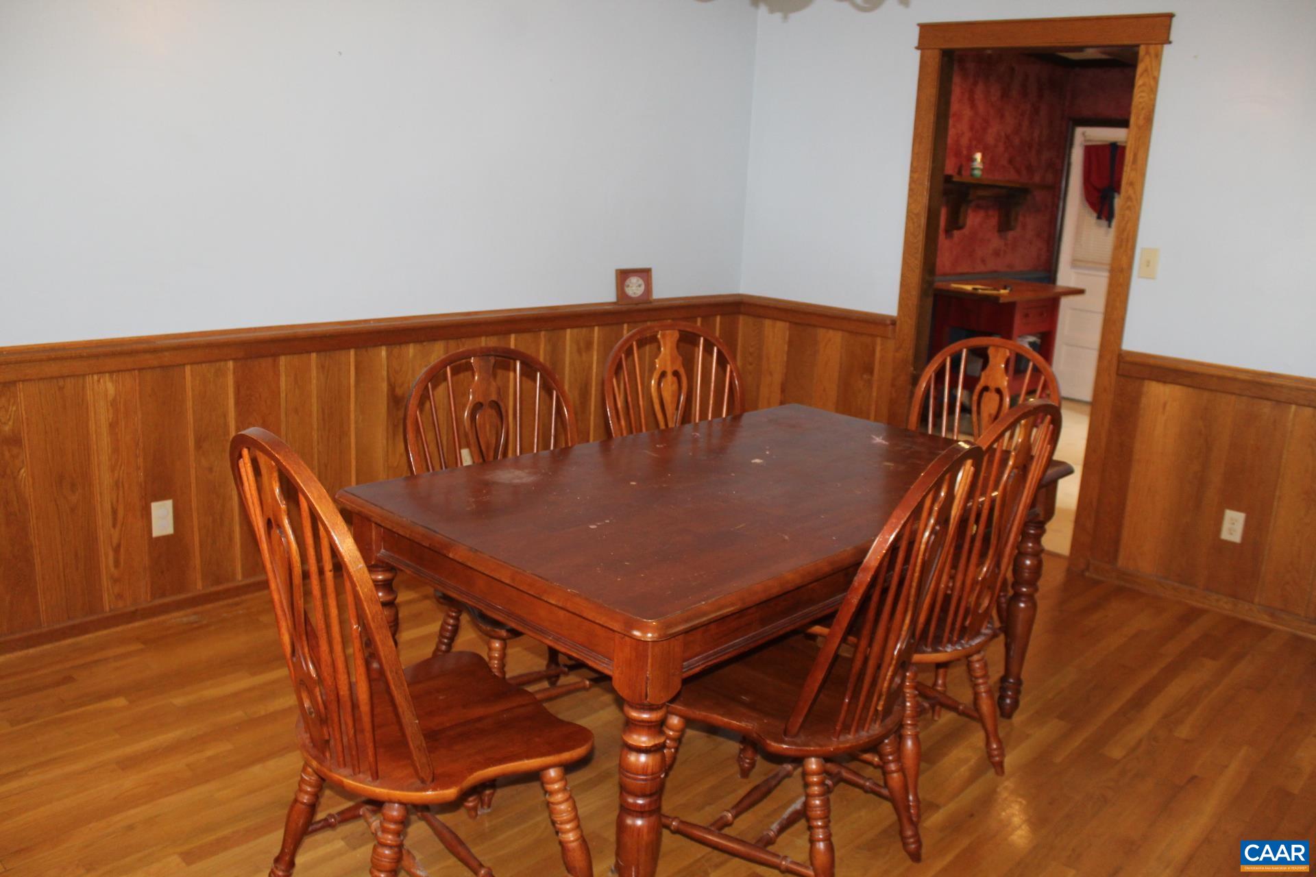 3456 South Constitution Route Dillwyn, VA 23936 - Photo 31 of 38 a view of a dining room with furniture and wooden floor