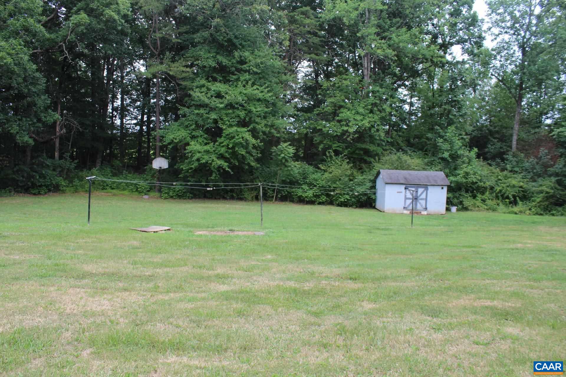 3456 South Constitution Route Dillwyn, VA 23936 - Photo 8 of 38 a backyard of a house with lots of green space
