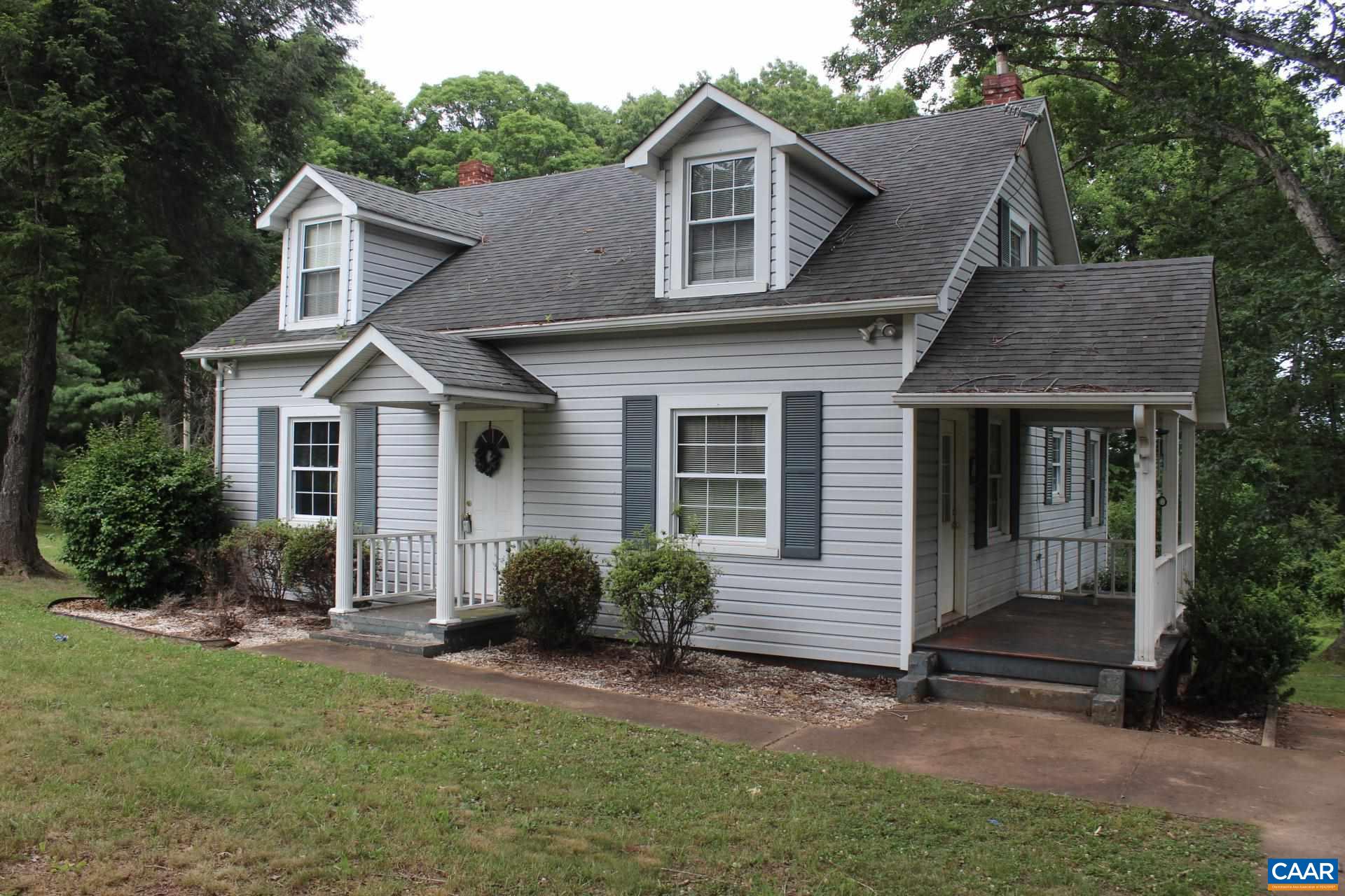 3456 South Constitution Route Dillwyn, VA 23936 - Photo 10 of 38 a view of a house with a yard plants and large tree