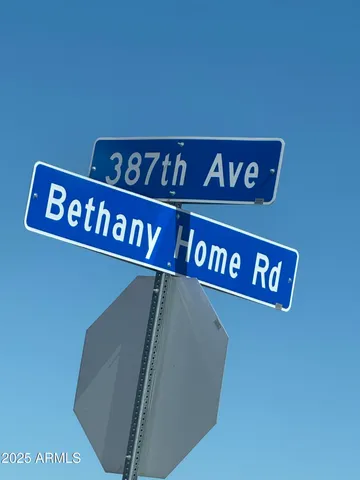a view of a two chairs in a patio