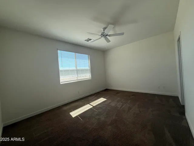 a bathroom with a double vanity sink toilet mirror and shower
