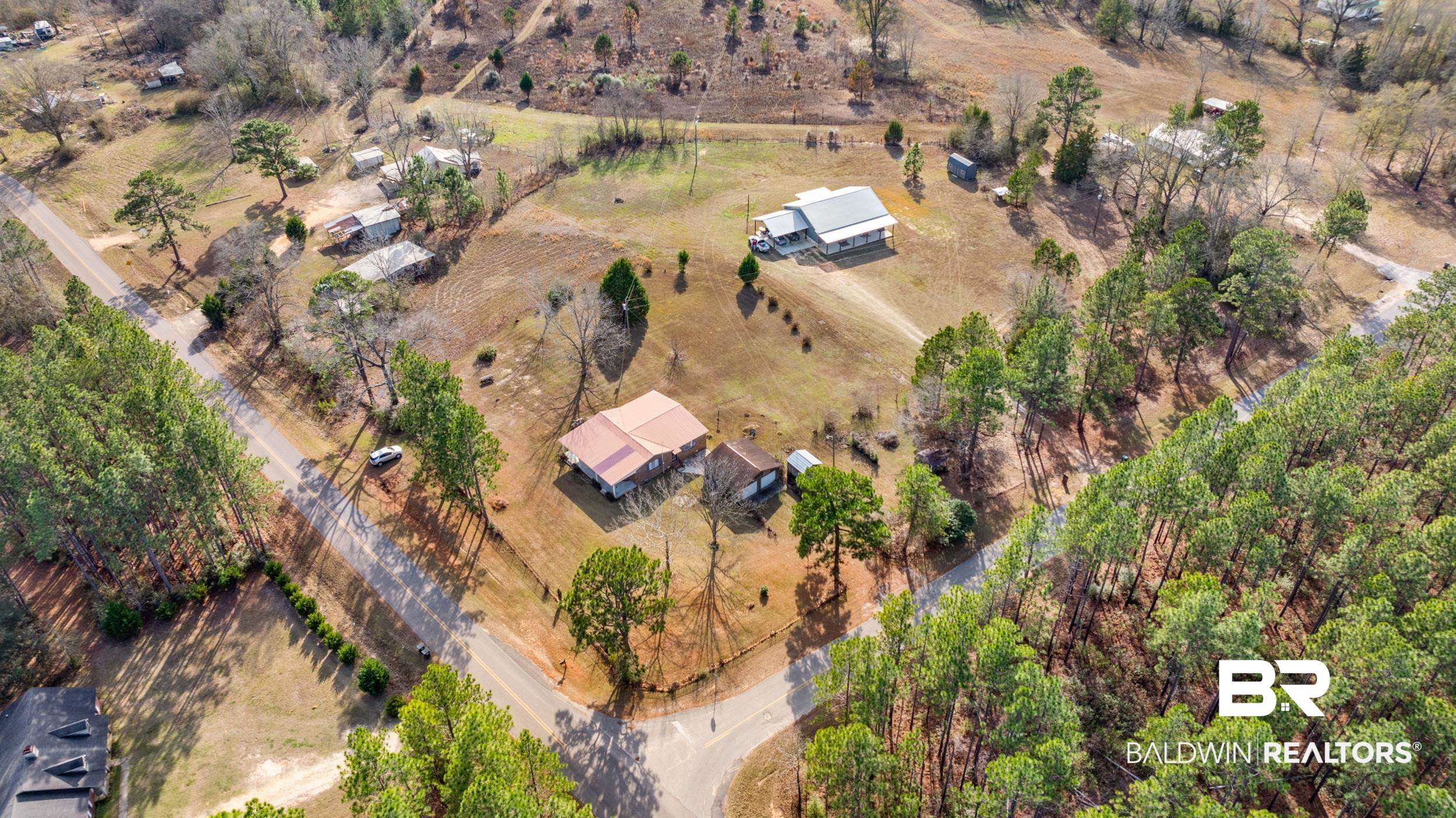 57623 Mary Hadley Road Perdido, AL 36562 - Photo 29 of 34 Aerial overview of property's location with rural landscape