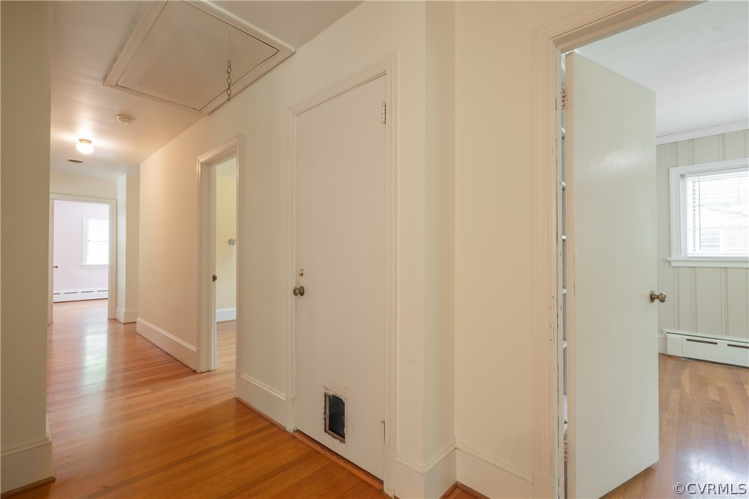 8401 Halesworth Road Richmond, VA 23235 - Photo 11 of 50 a view of a hallway with wooden floor