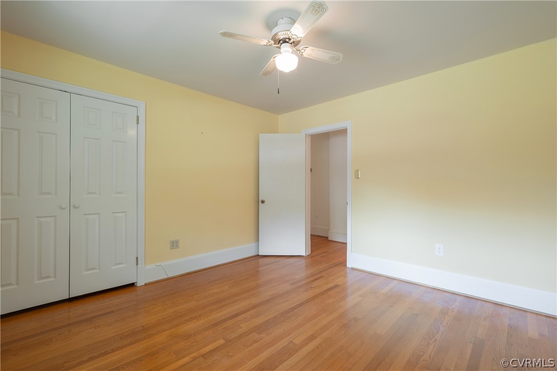 8401 Halesworth Road Richmond, VA 23235 - Photo 18 of 50 a view of an empty room with wooden floor