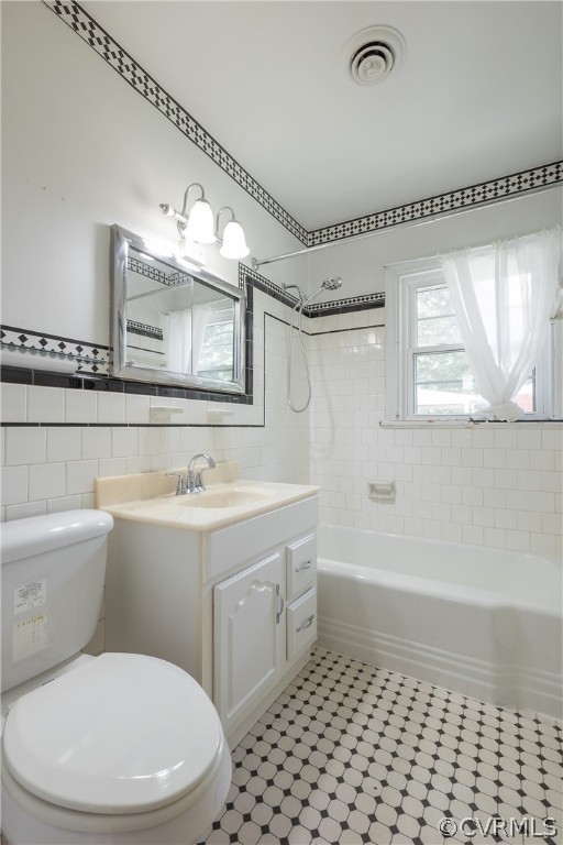 8401 Halesworth Road Richmond, VA 23235 - Photo 21 of 50 a bathroom with a sink a toilet and shower