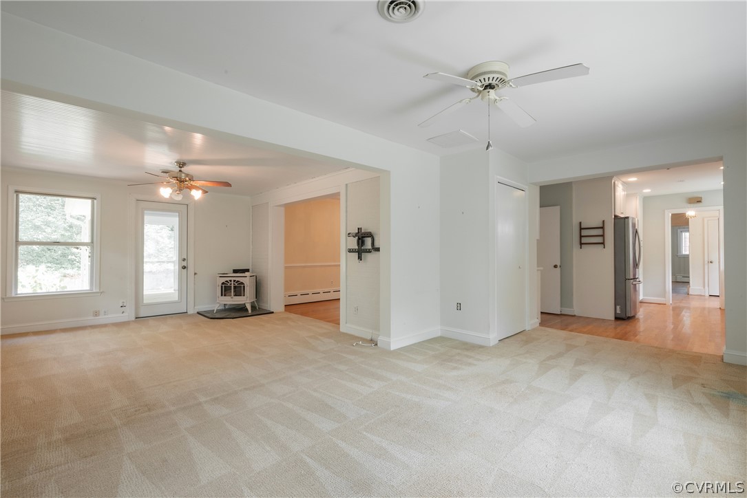 8401 Halesworth Road Richmond, VA 23235 - Photo 32 of 50 an empty room with fan and windows