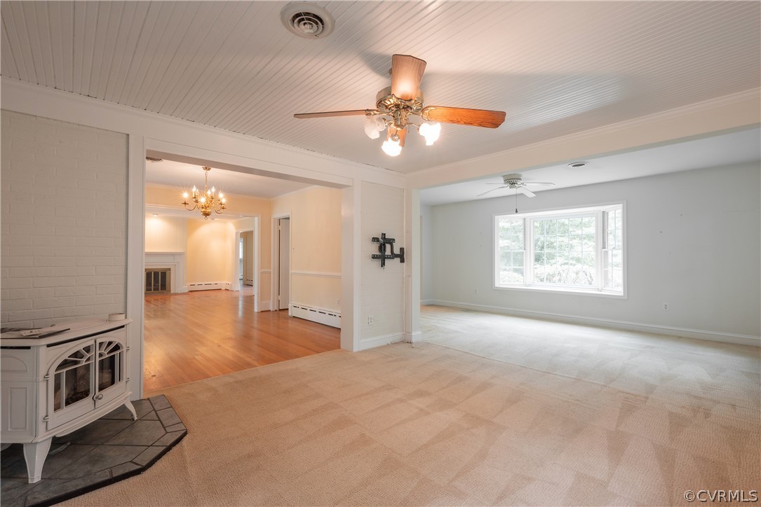 8401 Halesworth Road Richmond, VA 23235 - Photo 35 of 50 a view of a livingroom with a ceiling fan and window