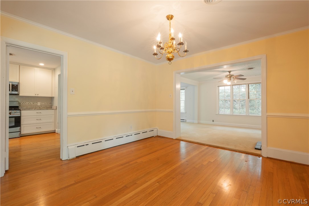 8401 Halesworth Road Richmond, VA 23235 - Photo 38 of 50 wooden floor in an empty room with a window