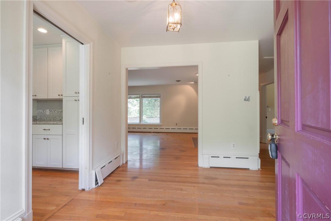 8401 Halesworth Road Richmond, VA 23235 - Photo 10 of 50 wooden floor with white walls