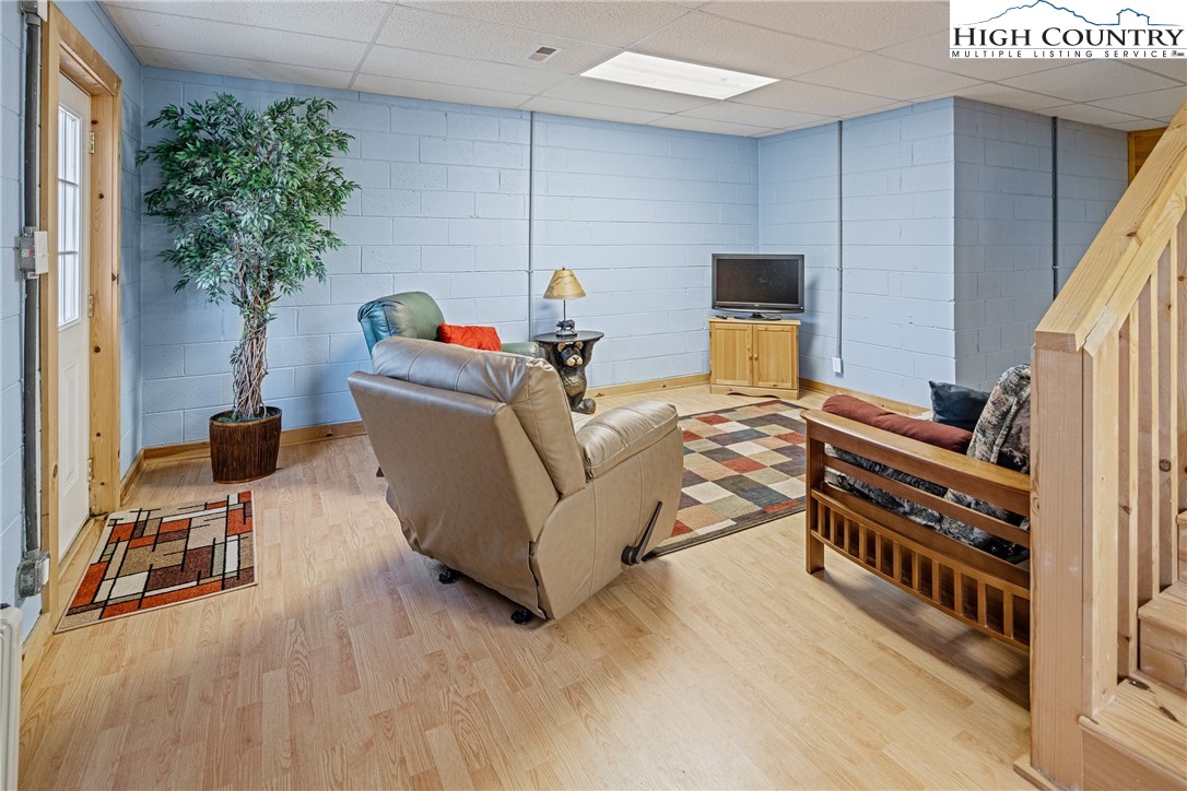 130 Alexander Drive Boone, NC 28607 - Photo 20 of 48 a living room with furniture and a window