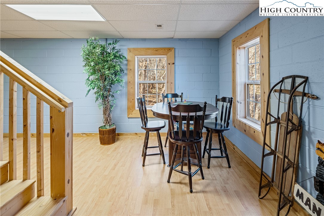 130 Alexander Drive Boone, NC 28607 - Photo 28 of 48 a view of a dining room with furniture window and wooden floor