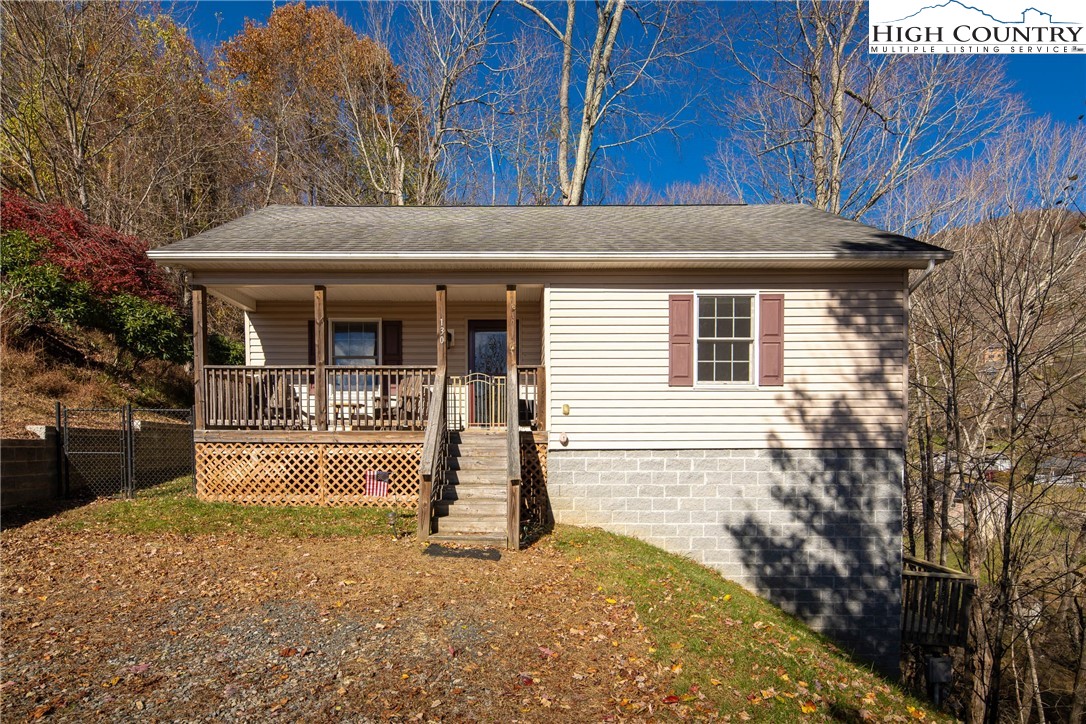130 Alexander Drive Boone, NC 28607 - Photo 32 of 48 a view of house with backyard and porch