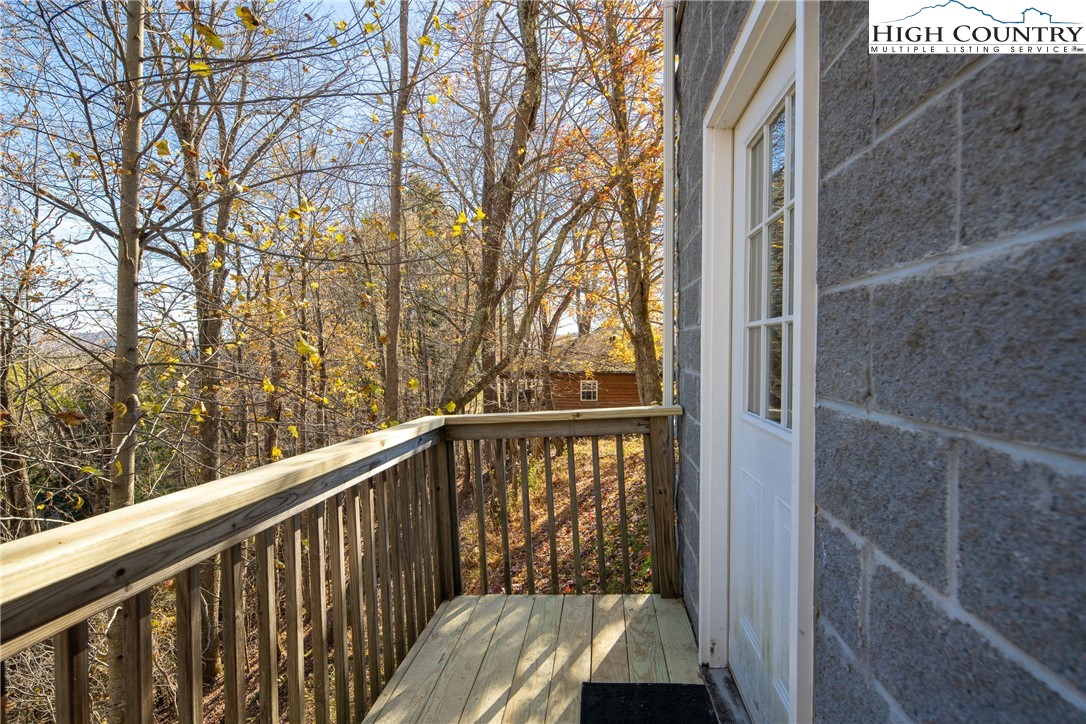 130 Alexander Drive Boone, NC 28607 - Photo 44 of 48 a view of balcony with wooden floor and fence