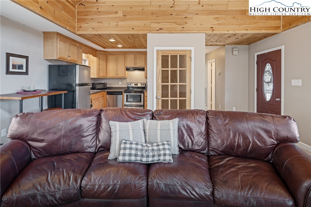 130 Alexander Drive Boone, NC 28607 - Photo 6 of 48 a living room with furniture and a large window
