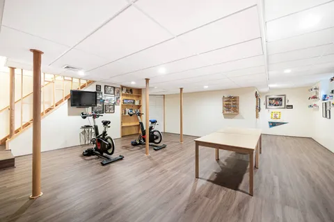 an aerial view of a house with outdoor space sitting space and swimming pool