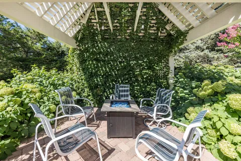 a view of a patio with swimming pool
