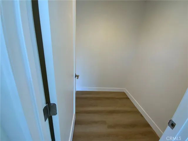 a view of staircase with white walls