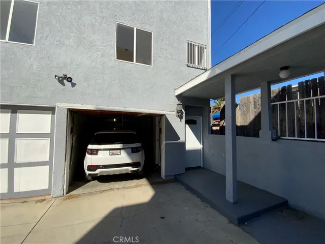 a view of living room with furniture and a window