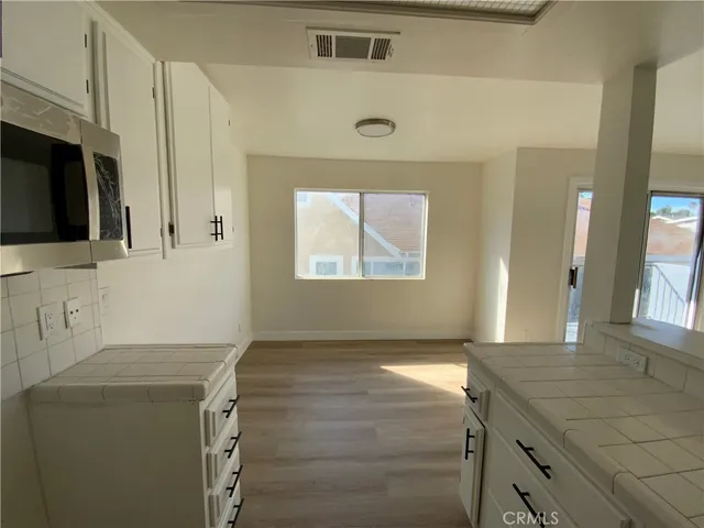 a view of hallway with washer and dryer