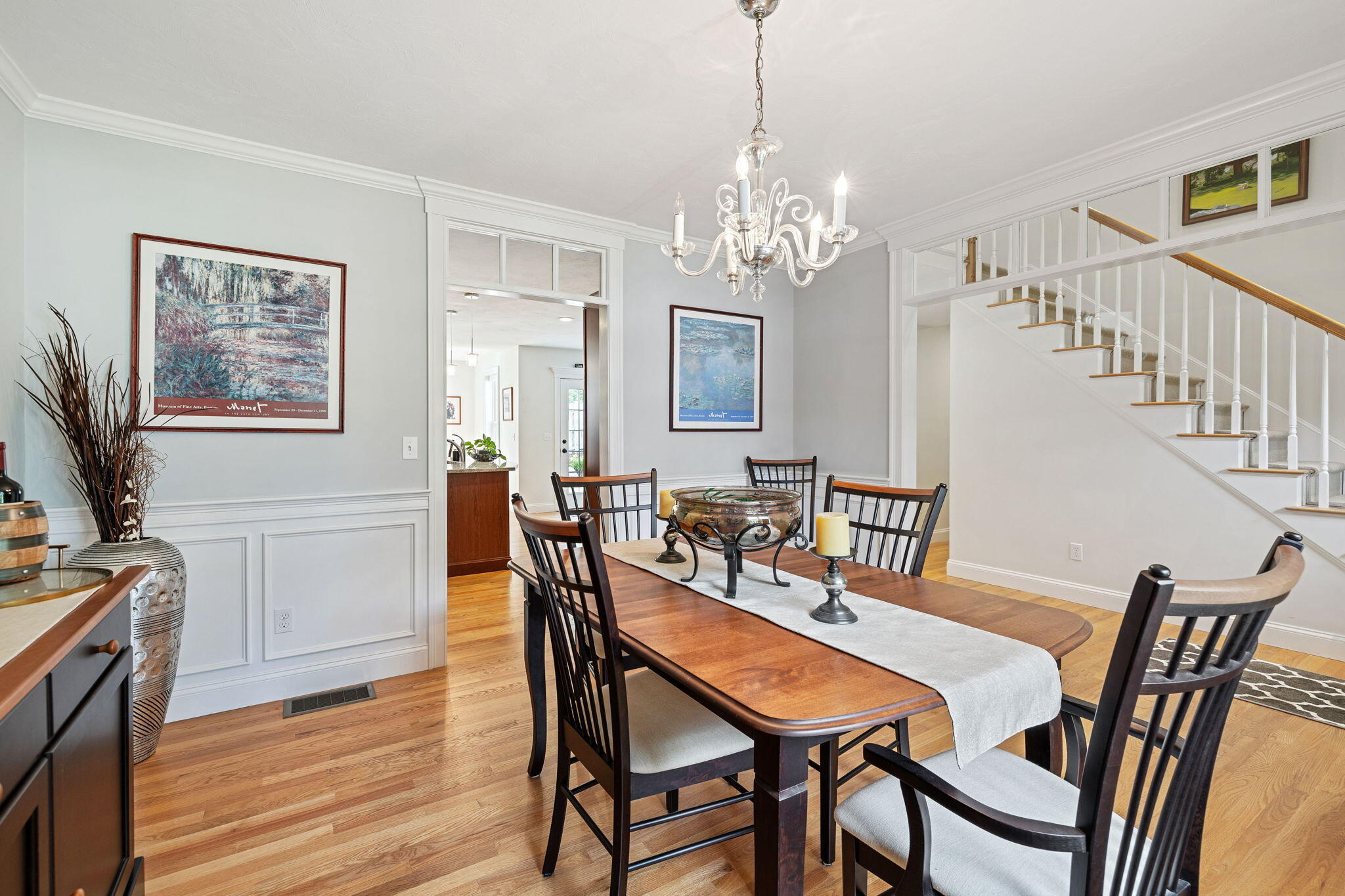 48 Meadowbrook Road Mashpee, MA 02649 - Photo 19 of 52 a view of a dining room with furniture a chandelier and wooden floor