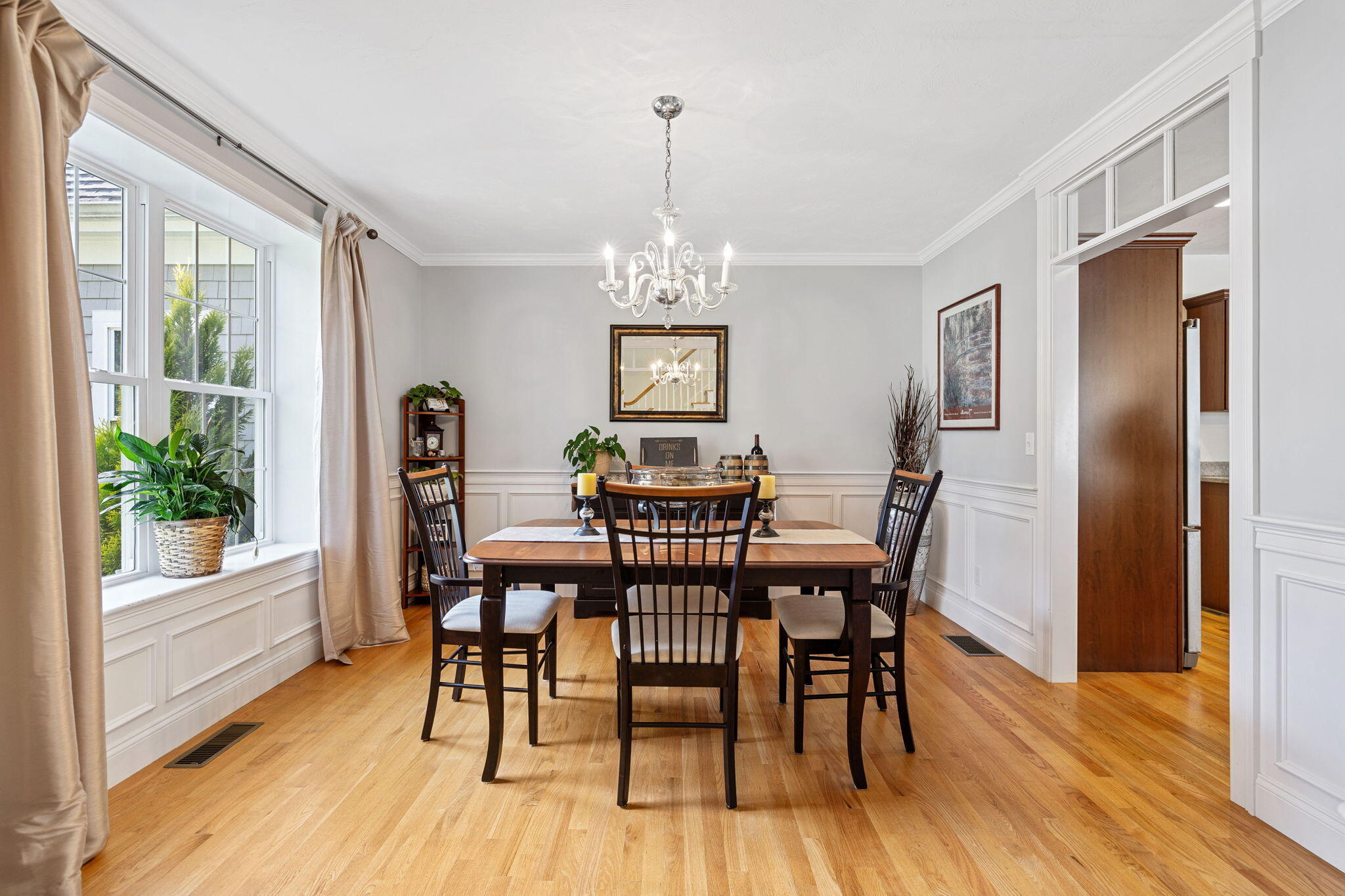 48 Meadowbrook Road Mashpee, MA 02649 - Photo 20 of 52 a view of a dining room with furniture window and wooden floor