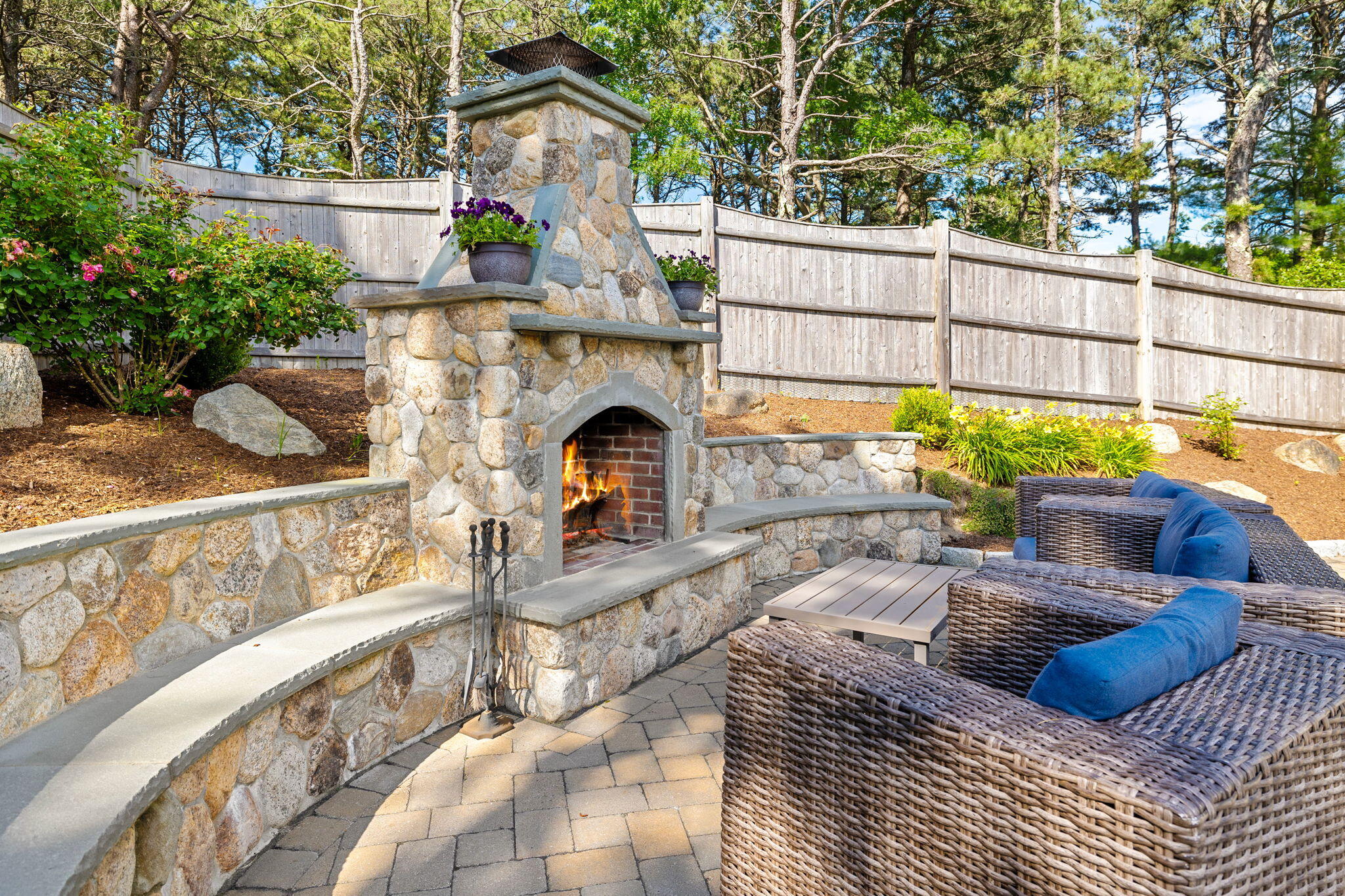 48 Meadowbrook Road Mashpee, MA 02649 - Photo 29 of 52 a view of balcony with two chairs and a fire pit
