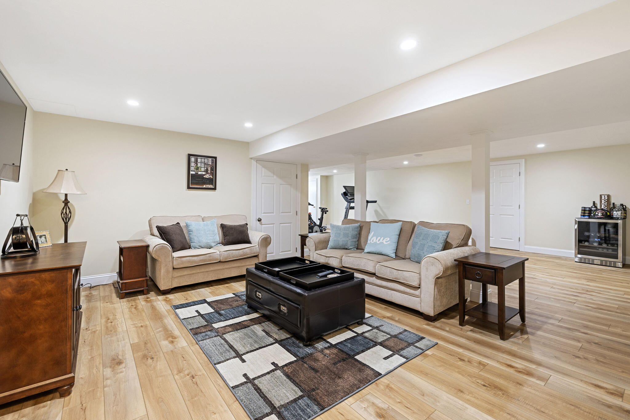 48 Meadowbrook Road Mashpee, MA 02649 - Photo 30 of 52 a living room with furniture a rug and a table