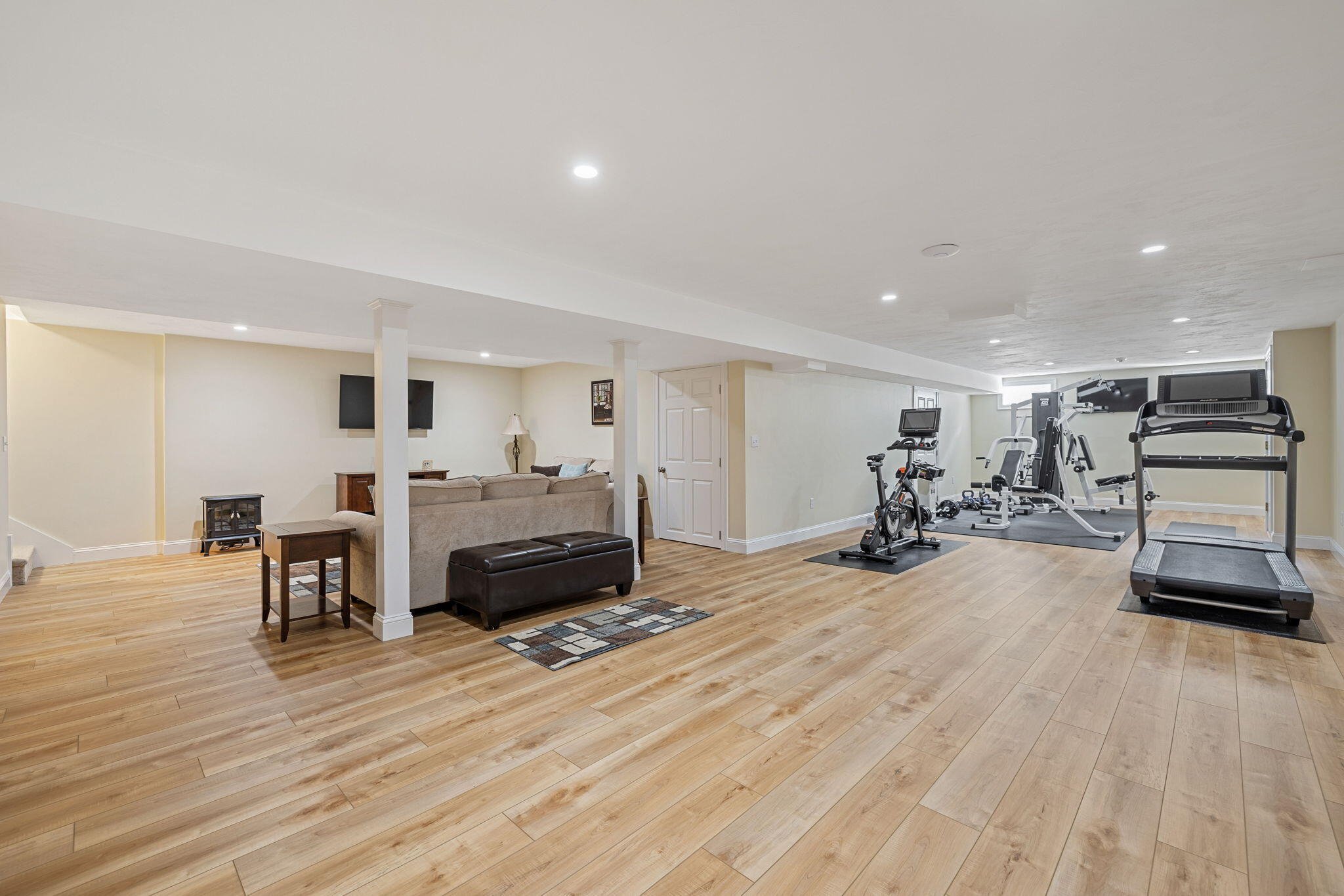 48 Meadowbrook Road Mashpee, MA 02649 - Photo 32 of 52 a room with furniture and a wooden floor