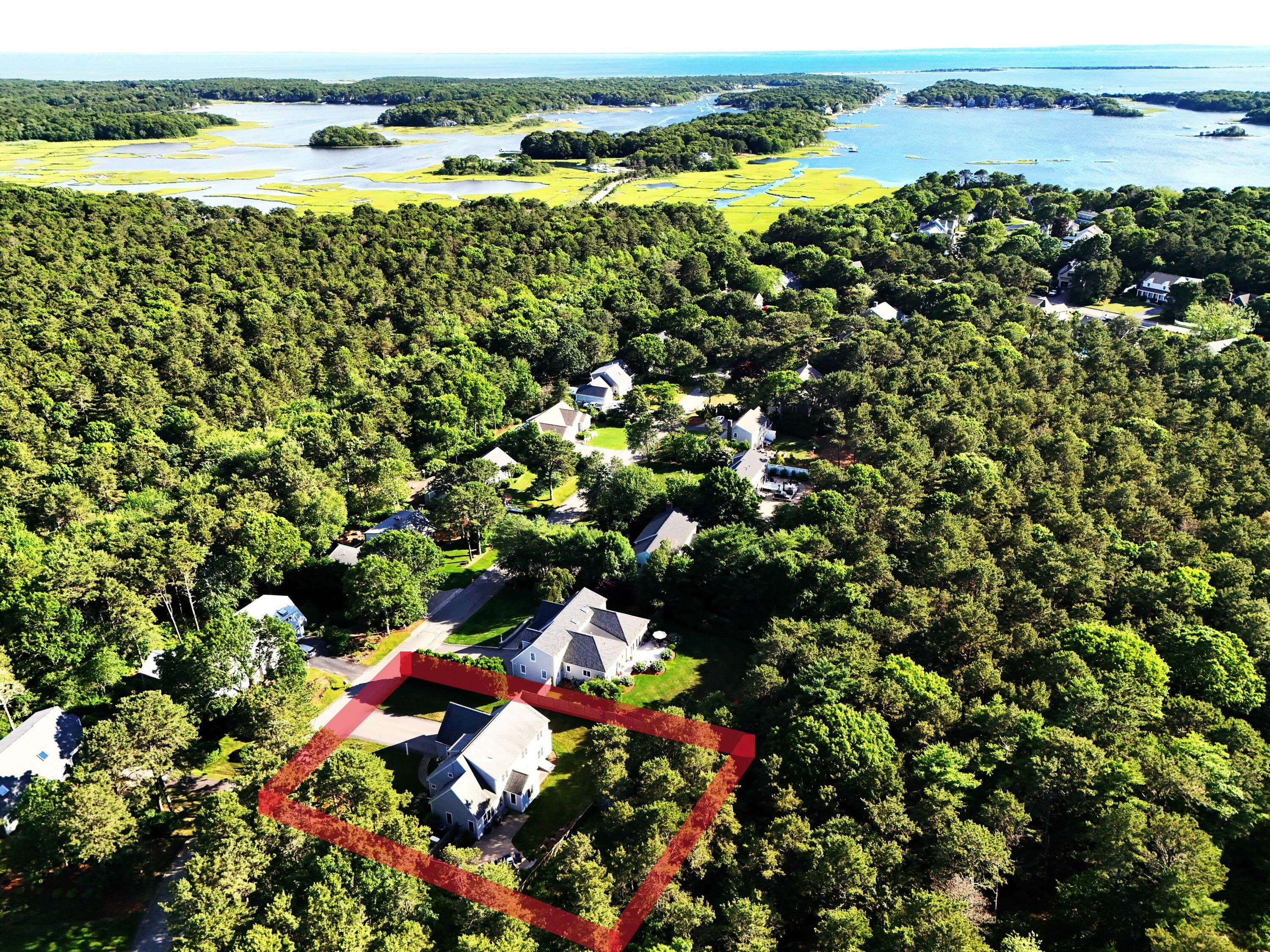 48 Meadowbrook Road Mashpee, MA 02649 - Photo 4 of 52 a view of a lake with outdoor space
