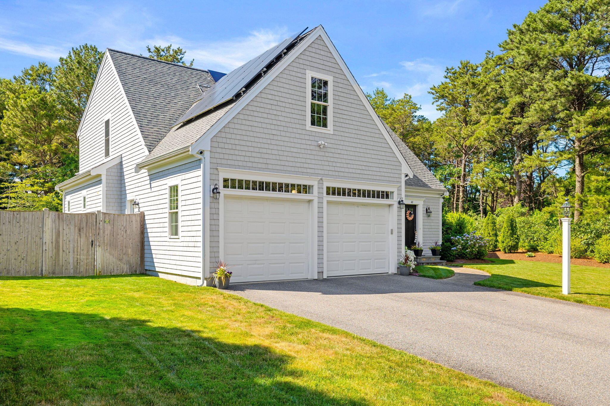 48 Meadowbrook Road Mashpee, MA 02649 - Photo 44 of 52 front view of a house and a yard